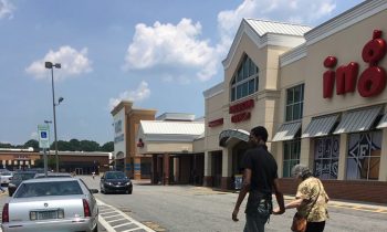 Young Man Helps Elderly Woman Walk Across Parking Lot, Restores Faith In Humanity