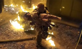 Video Shows Firefighter Catch Child Thrown From 3rd Story Balcony During Apartment Fire