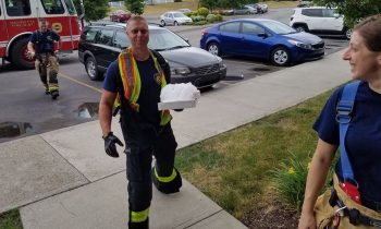 Fire Department Delivers Pizza For Driver Injured In Car Crash