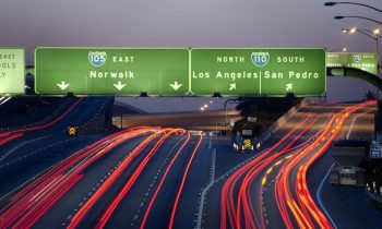 C’mon, Guys: Half-Naked Protester Climbs L.A. Freeway Sign Before Doing Backflip Into Custody