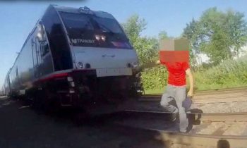 Bodycam Footage Shows Police Officer Save Man Just Seconds Away From Being Hit By Train